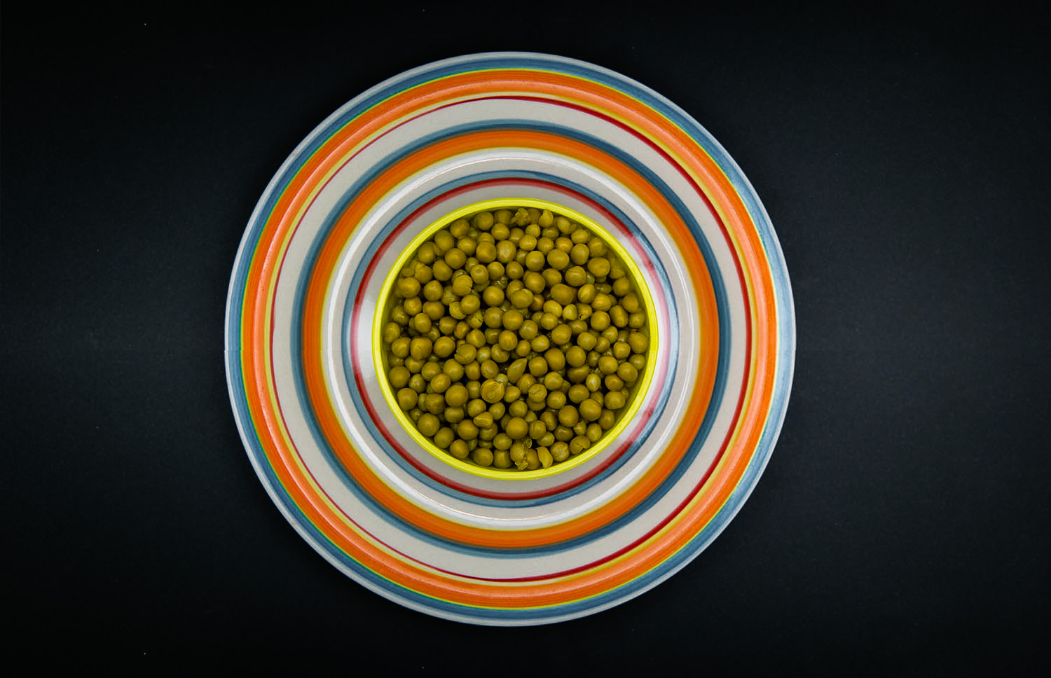 dish of peas on a table