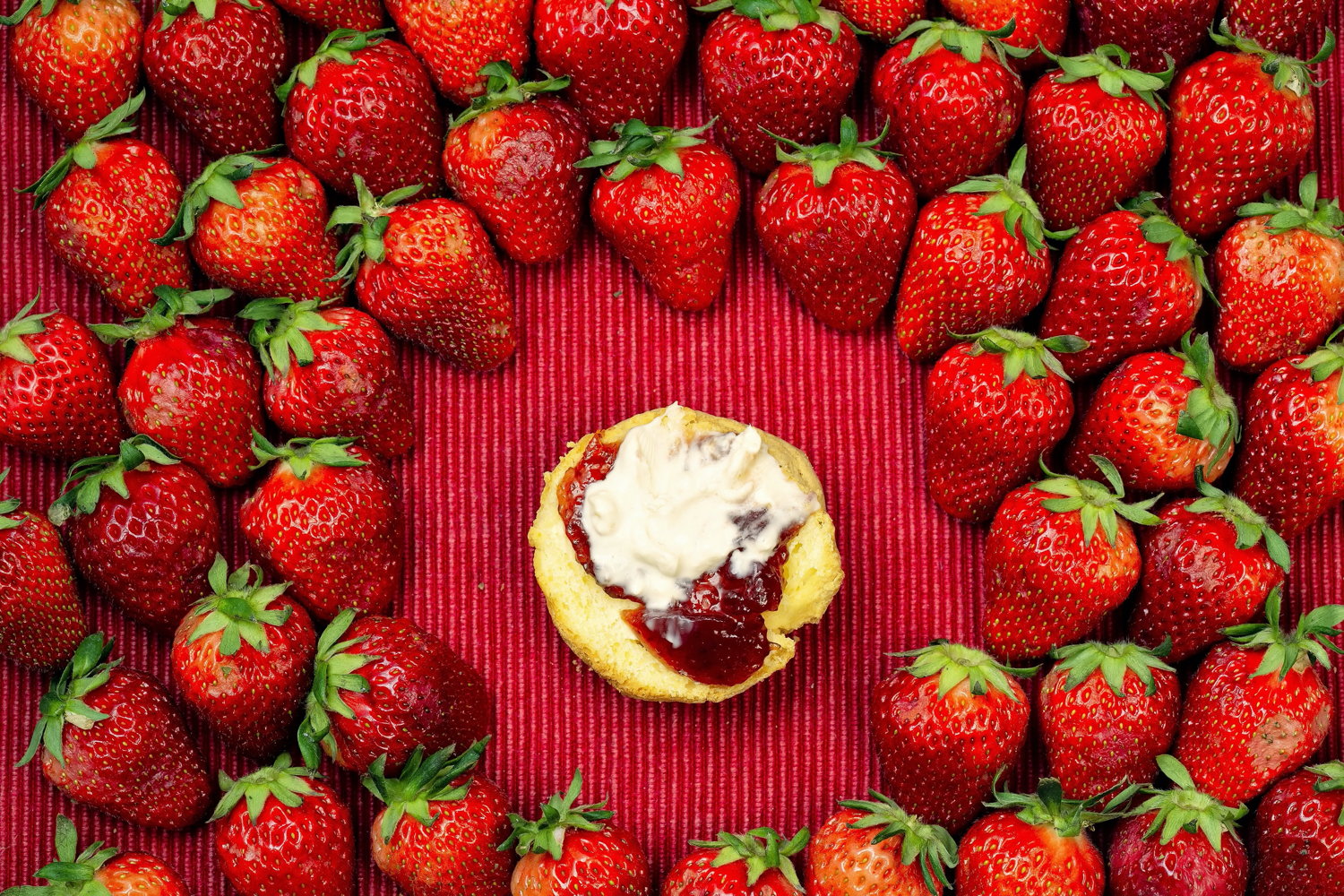 strawberries framing the food in the center